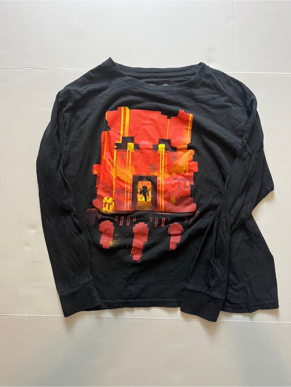 Kids Black Long-Sleeve Graphic Tee with Red & Yellow Pixel Art